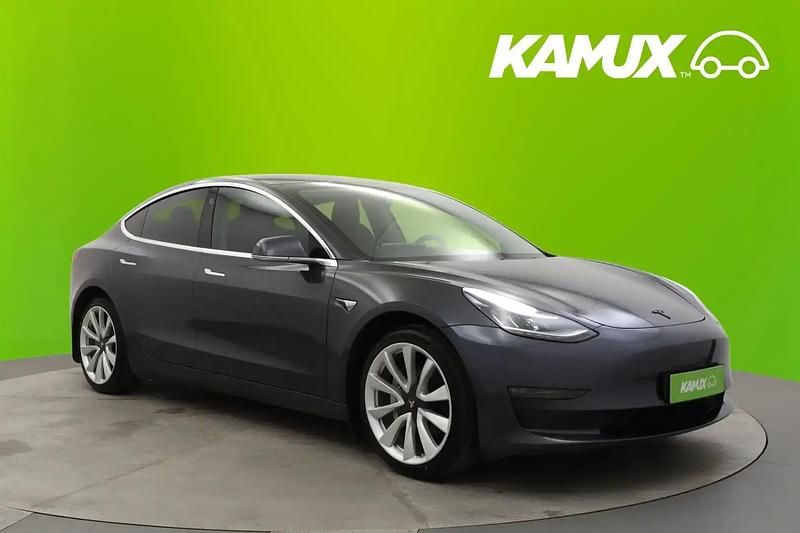 Hopea / harmaa Käytetty 2019 Tesla Model 3 Standard Range Sedan | 20 650 € (Perustarjous) - Kuva 1/4