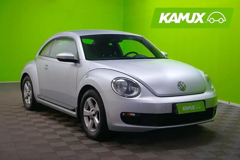 Käytetty VW Beetle 105 HP (77 kW) 2012 Hopea / harmaa Sedan