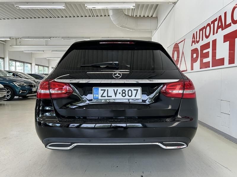 Käytetty Mercedes C250 Business 204 HP (150 kW) 2014 Musta Farmari