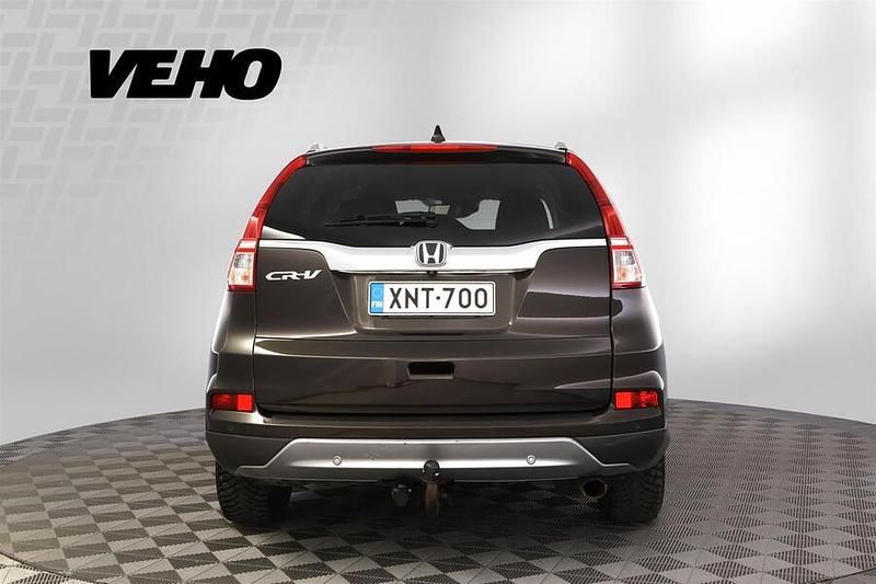 Käytetty Honda CR-V Elegance Plus 160 HP (117 kW) 2016 Ruskea Katumaasturi