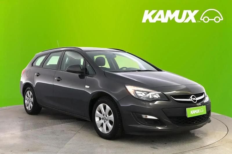 Hopea / harmaa Käytetty 2014 Opel Astra Enjoy Farmari | 6 790 € (Hyvä tarjous) - Kuva 1/4