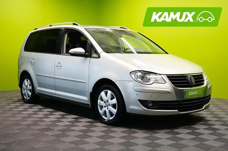 Käytetty VW Touran Trendline 140 HP (102 kW) 2009 Hopea / harmaa Tila-auto