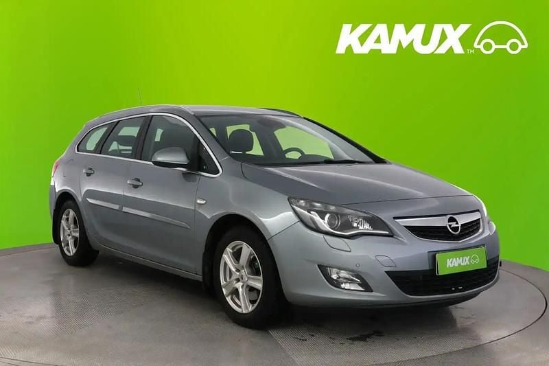 Hopea / harmaa Käytetty 2011 Opel Astra Sport Farmari | 5 900 € (Hieman kallis) - Kuva 1/4