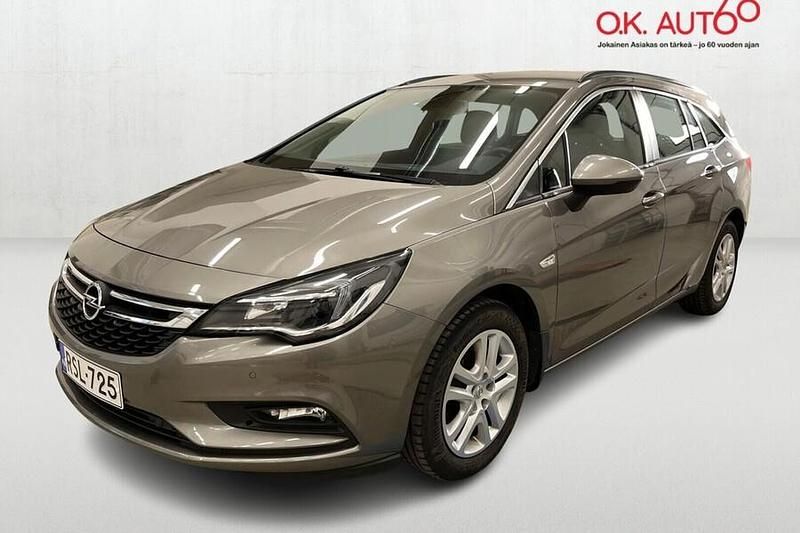 Ruskea (beige) Käytetty 2016 Opel Astra Enjoy Farmari | 11 500 € (Hieman kallis) - Kuva 1/4