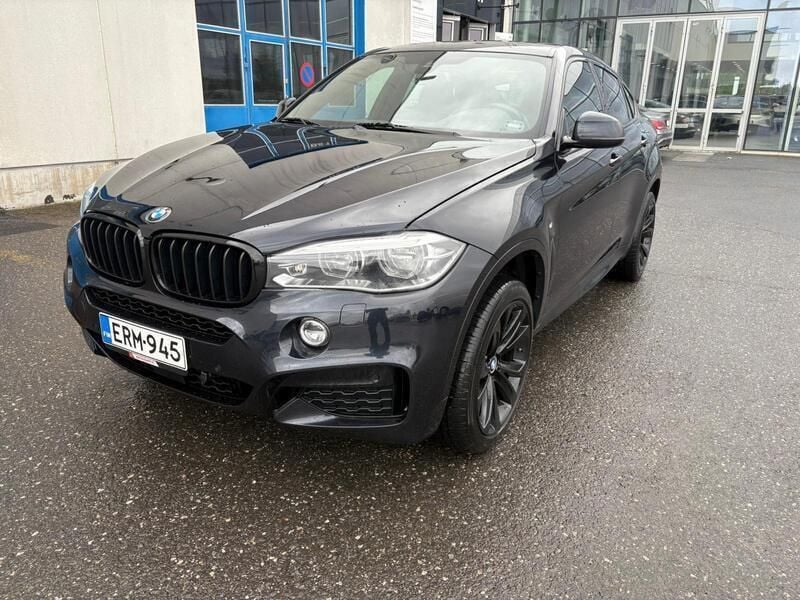 Musta Käytetty 2014 BMW X6 Comfort Edition Katumaasturi | 29 490 € (Perustarjous) - Kuva 1/4