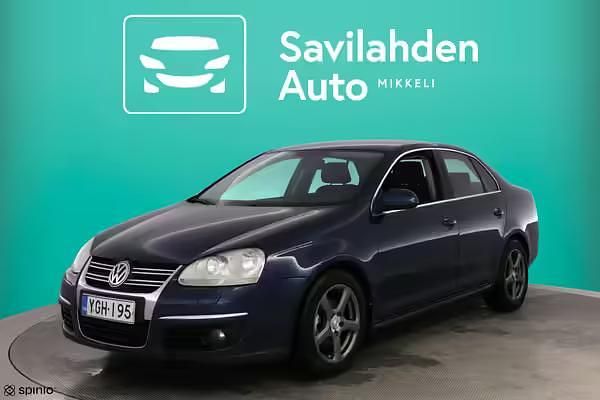 Käytetty VW Touran 143 HP (105 kW) 2006 Harmaa Tila-auto