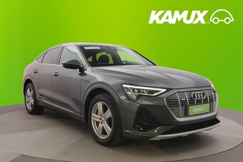 Hopea / harmaa Käytetty 2021 Audi e-tron Sportback S-Line Katumaasturi | 28 700 € (Perustarjous) - Kuva 1/4
