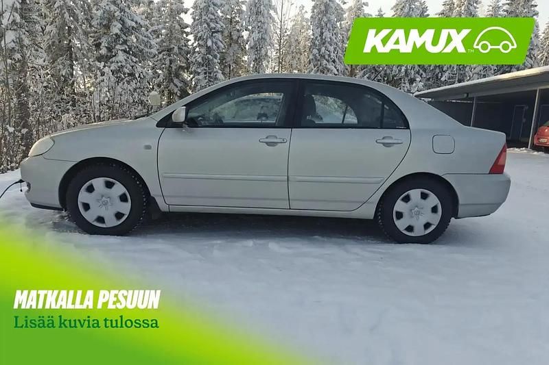 Käytetty Toyota Corolla 110 HP (80 kW) 2004 Hopea / harmaa Sedan