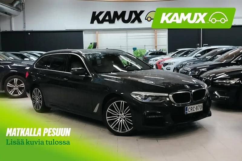 Hopea / harmaa Käytetty 2019 BMW 520 M Sport Farmari | 21 700 € (Hieman kallis) - Kuva 1/4