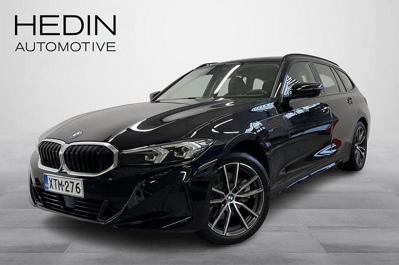 Musta Käytetty 2025 BMW 330e Farmari | 50 900 € - Kuva 1/4