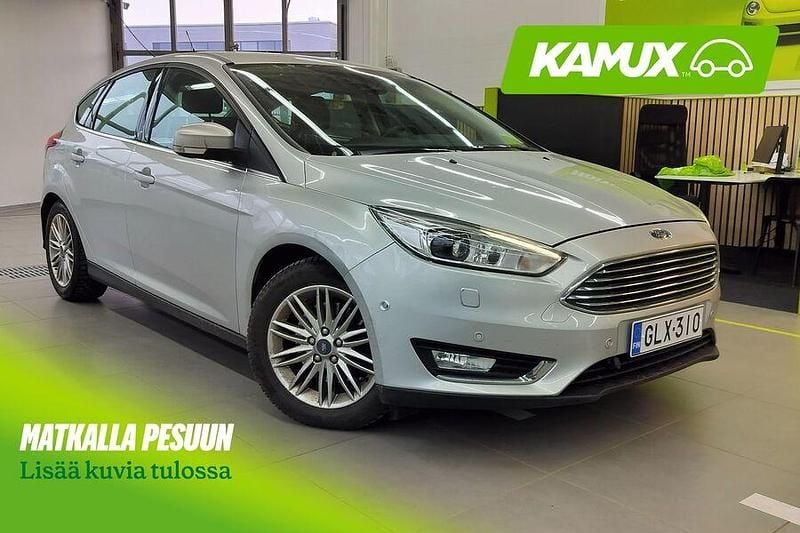 Hopea / harmaa Käytetty 2016 Ford Focus Titanium Sedan | 12 890 € (Hyvä tarjous) - Kuva 1/4