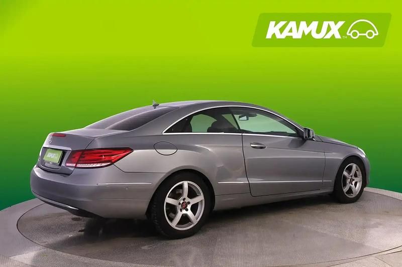 Käytetty Mercedes E220 170 HP (125 kW) 2014 Hopea / harmaa Coupe - kaksiovinen