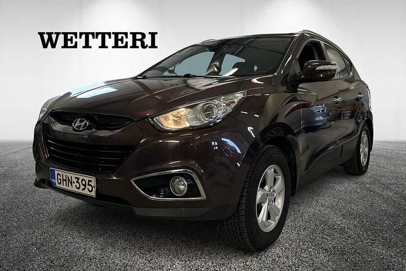 Ruskea Käytetty 2011 Hyundai ix35 Comfort Katumaasturi | 8 990 € (Perustarjous) - Kuva 1/3