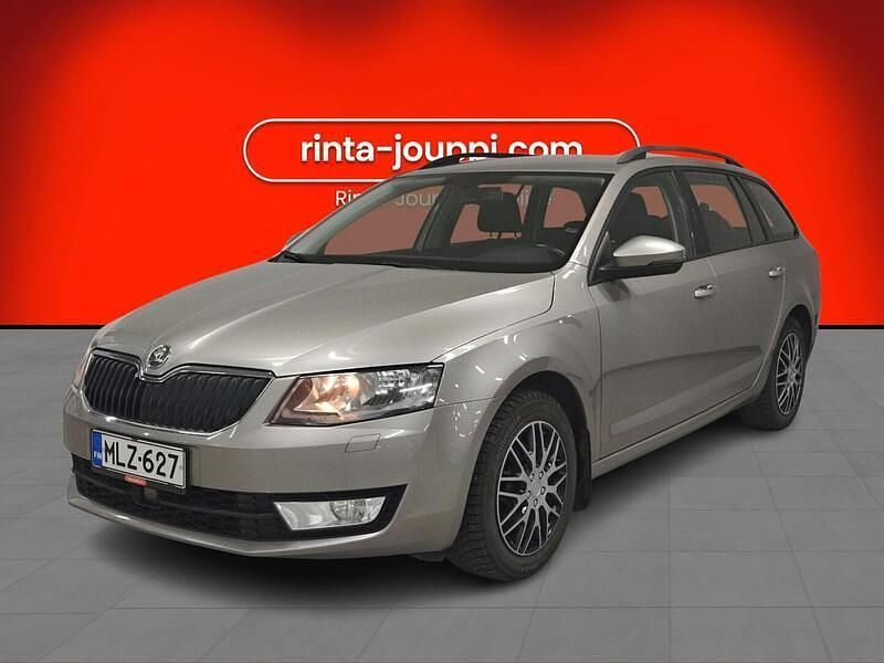 Ruskea Käytetty 2014 Skoda Octavia Ambition Farmari | 9 880 € (Perustarjous) - Kuva 1/3