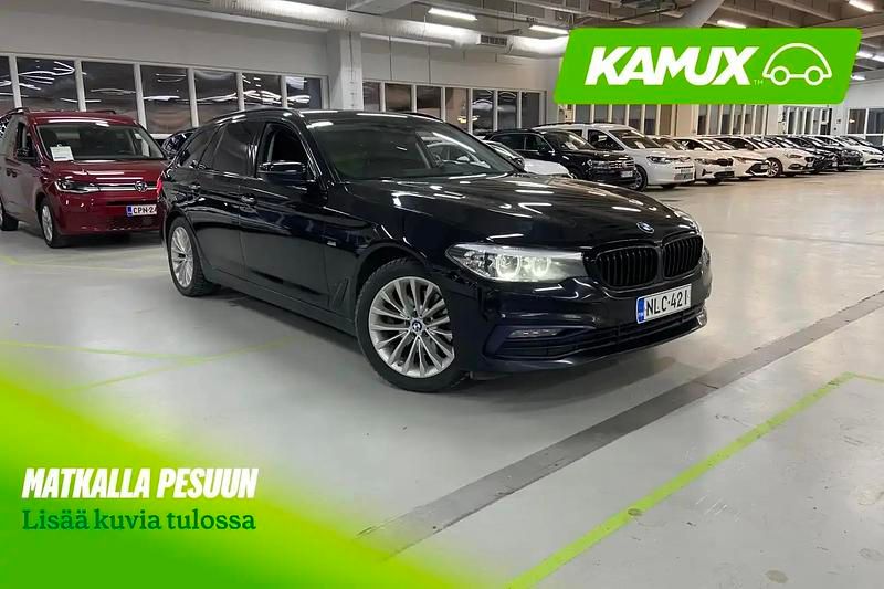 Musta Käytetty 2018 BMW 520 Sport Line Farmari | 17 990 € (Perustarjous) - Kuva 1/4