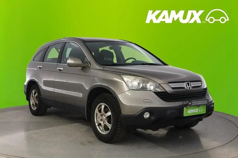 Hopea / harmaa Käytetty 2009 Honda CR-V Elegance Katumaasturi | 6 890 € (Hyvä tarjous) - Kuva 1/4
