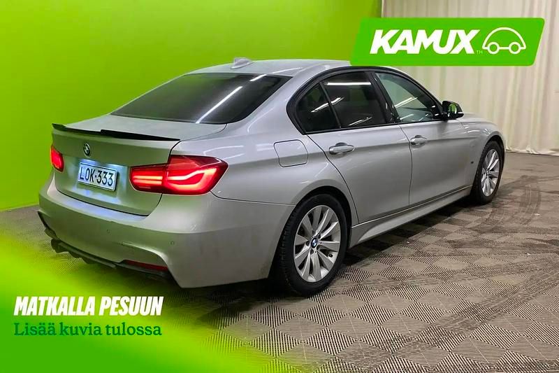 Käytetty BMW 330e Exclusive 252 HP (185 kW) 2018 Hopea / harmaa Sedan