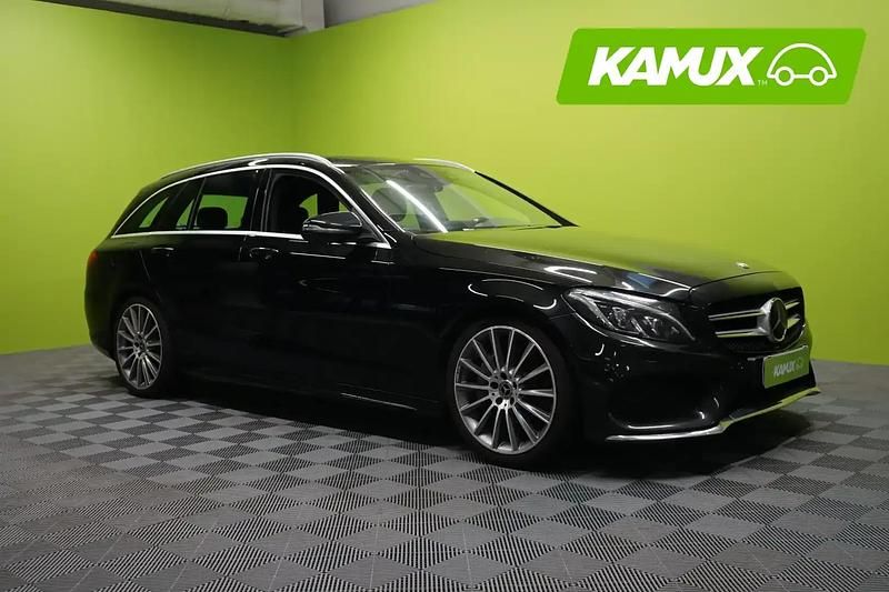 Musta Käytetty 2018 Mercedes C350e AMG Farmari | 21 990 € (Kallis) - Kuva 1/4
