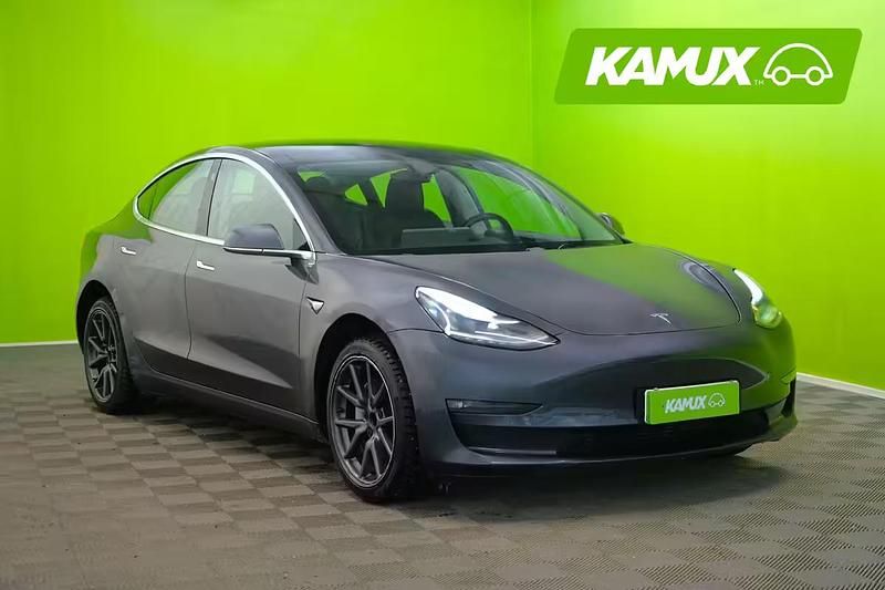 Hopea / harmaa Käytetty 2019 Tesla Model 3 Standard Range Sedan | 14 990 € (Hieman kallis) - Kuva 1/4
