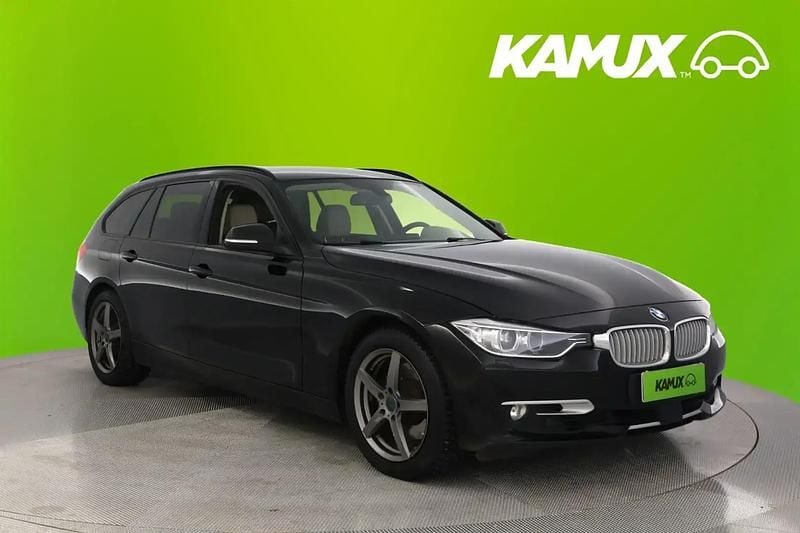 Musta Käytetty 2013 BMW 330 Farmari | 18 390 € - Kuva 1/4