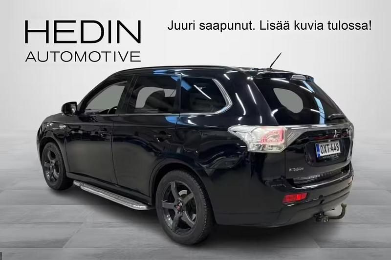 Käytetty Mitsubishi Outlander P-HEV Intense 121 HP (88 kW) 2013 Ruskea (beige) Katumaasturi