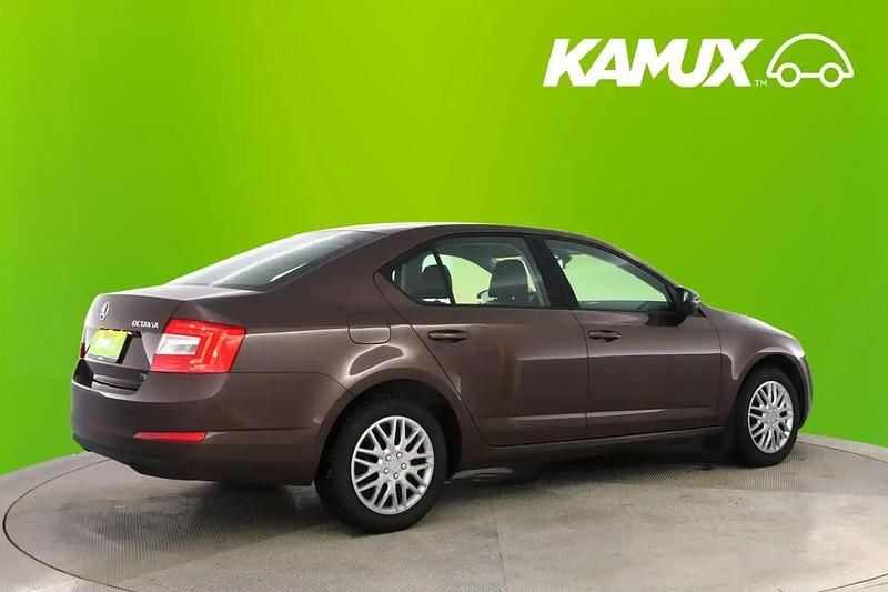 Käytetty Skoda Octavia Ambition 105 HP (77 kW) 2014 Ruskea Sedan