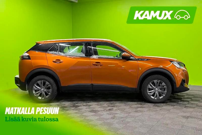 Käytetty Peugeot e-2008 Active 100 kW (136 HP) 2021 Fusion orange paint/painted metallic ext trim type Katumaasturi