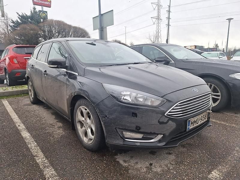 Musta Käytetty 2017 Ford Focus Titanium Farmari | 9 480 € (Perustarjous) - Kuva 1/4