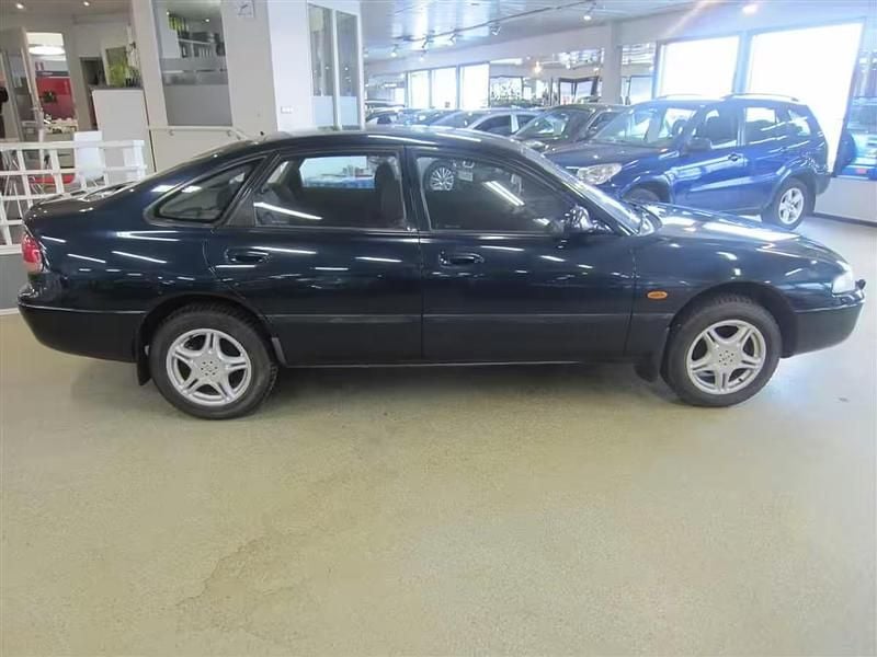 Käytetty Mazda 626 158 HP (116 kW) 1996 Vihreä Viistoperä