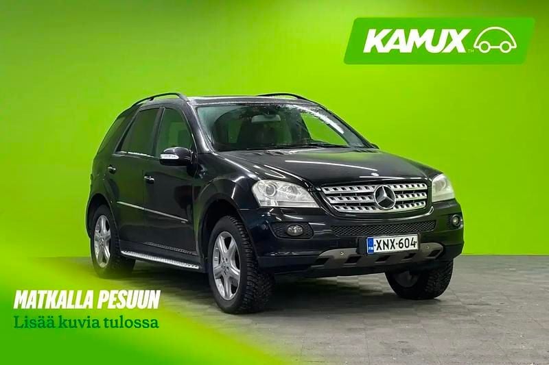 Musta Käytetty 2009 Mercedes ML320 Katumaasturi | 6 990 € - Kuva 1/4