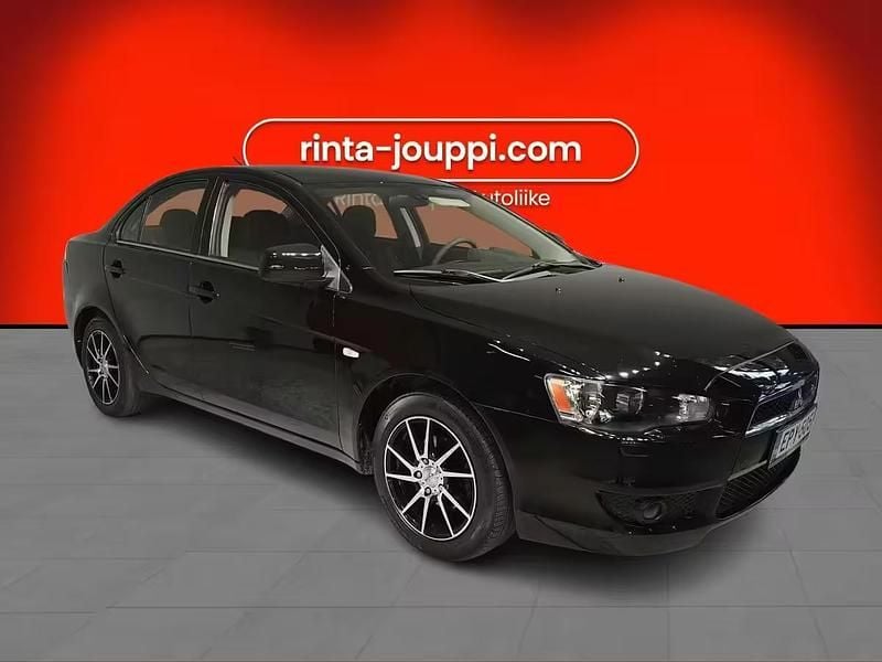 Käytetty Mitsubishi Lancer Invite 117 HP (86 kW) 2013 Musta Sedan