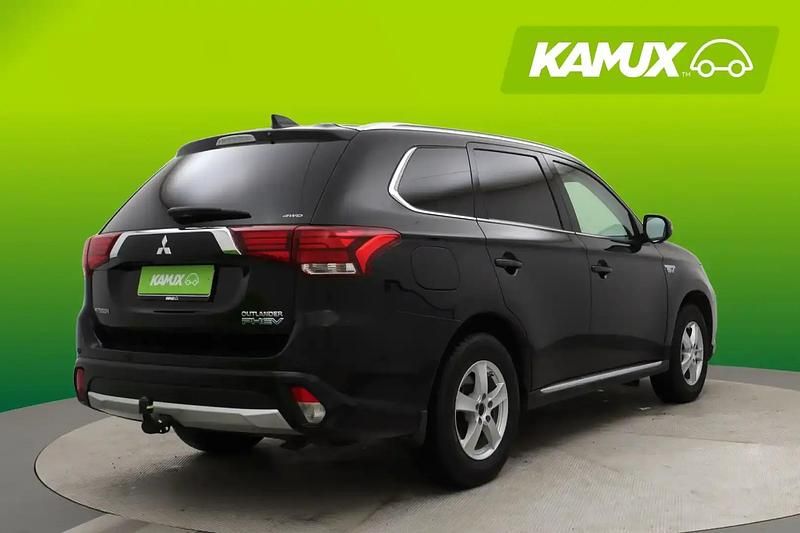 Käytetty Mitsubishi Outlander P-HEV 121 HP (88 kW) 2016 Musta Farmari