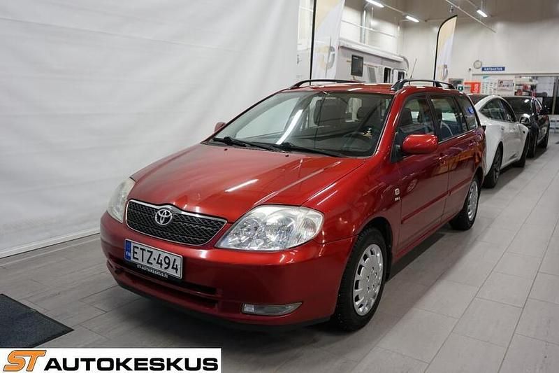 Met. punainen Käytetty 2003 Toyota Corolla Farmari | 3 990 € (Perustarjous) - Kuva 1/4