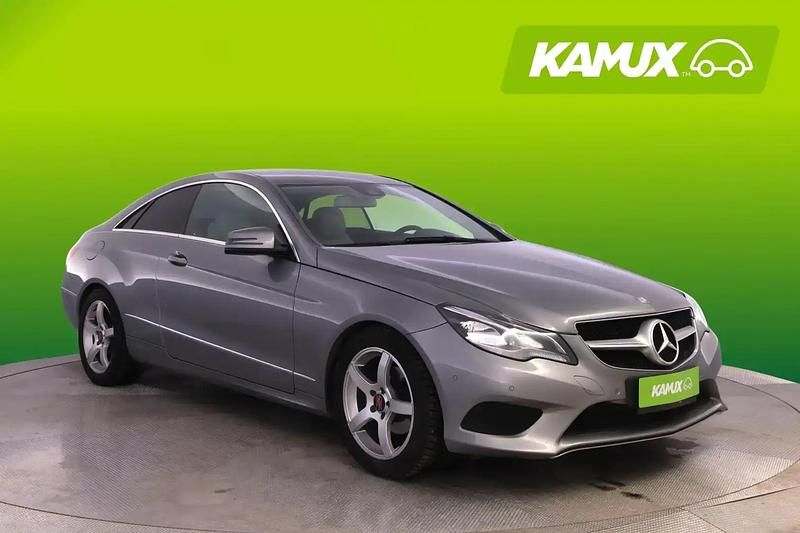 Käytetty Mercedes E220 170 HP (125 kW) 2014 Hopea / harmaa Coupe - kaksiovinen