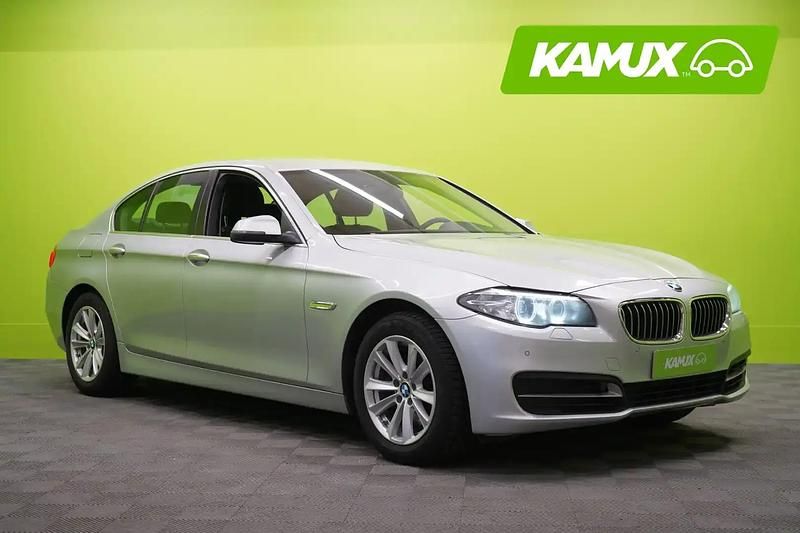 Käytetty BMW 518 150 HP (110 kW) 2015 Hopea / harmaa Sedan