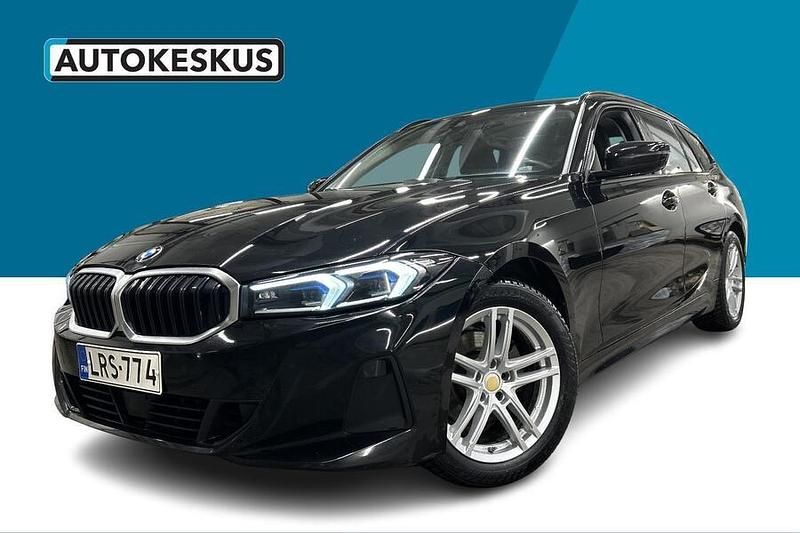 Musta Käytetty 2023 BMW 320e Farmari | 38 890 € - Kuva 1/3