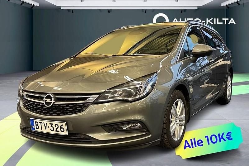 Met. harmaa Käytetty 2016 Opel Astra Innovation Farmari | 9 250 € (Perustarjous) - Kuva 1/4