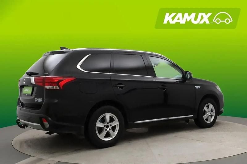 Käytetty Mitsubishi Outlander P-HEV 121 HP (88 kW) 2016 Musta Farmari