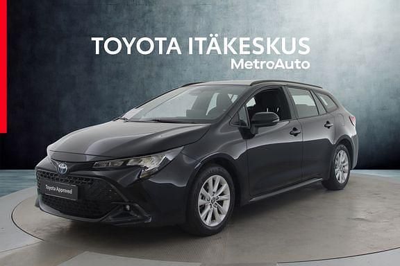 Musta Käytetty 2024 Toyota Corolla Active Farmari | 26 990 € (Perustarjous) - Kuva 1/4