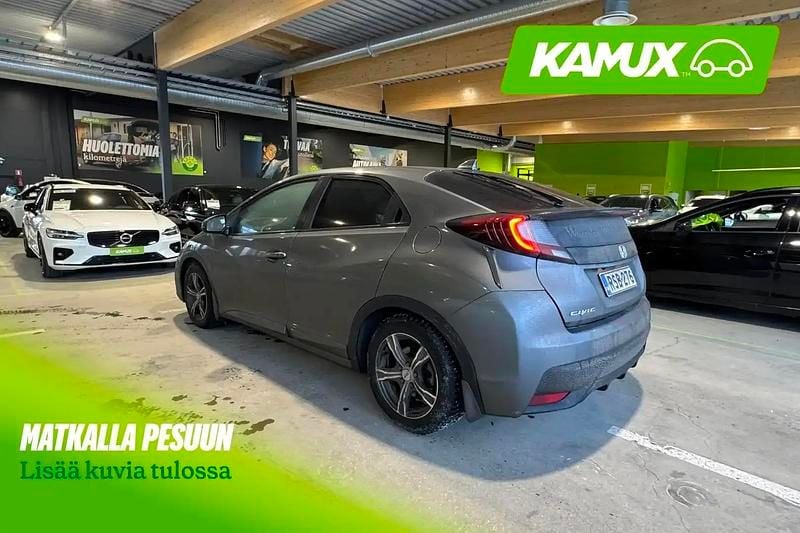 Käytetty Honda Civic 120 HP (88 kW) 2015 Hopea / harmaa Sedan