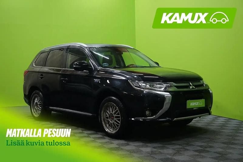 Musta Käytetty 2016 Mitsubishi Outlander P-HEV Instyle Sedan | 15 750 € - Kuva 1/4