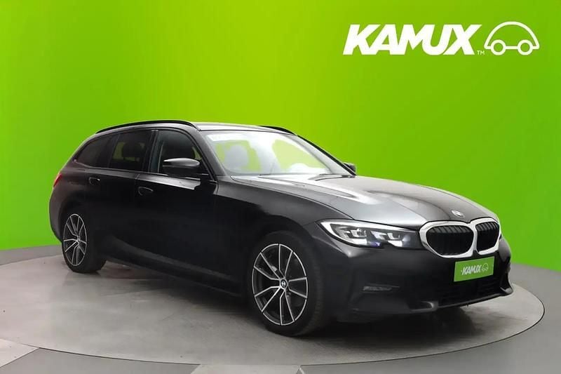 Musta Käytetty 2020 BMW 320 Sport Line Farmari | 26 870 € (Kallis) - Kuva 1/4