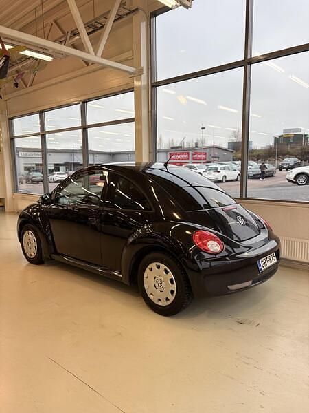 Käytetty VW New Beetle 102 HP (75 kW) 2007 Musta Viistoperä