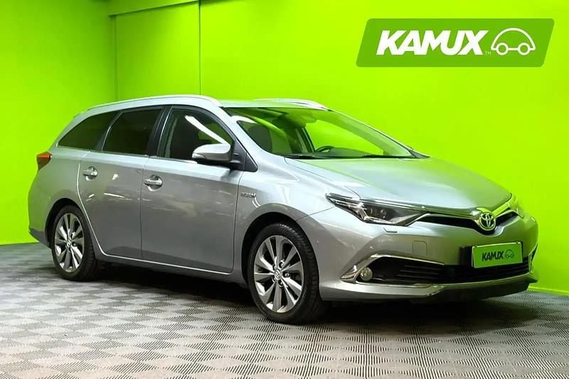 Hopea / harmaa Käytetty 2016 Toyota Auris Touring Sports Executive Farmari | 14 190 € (Perustarjous) - Kuva 1/4