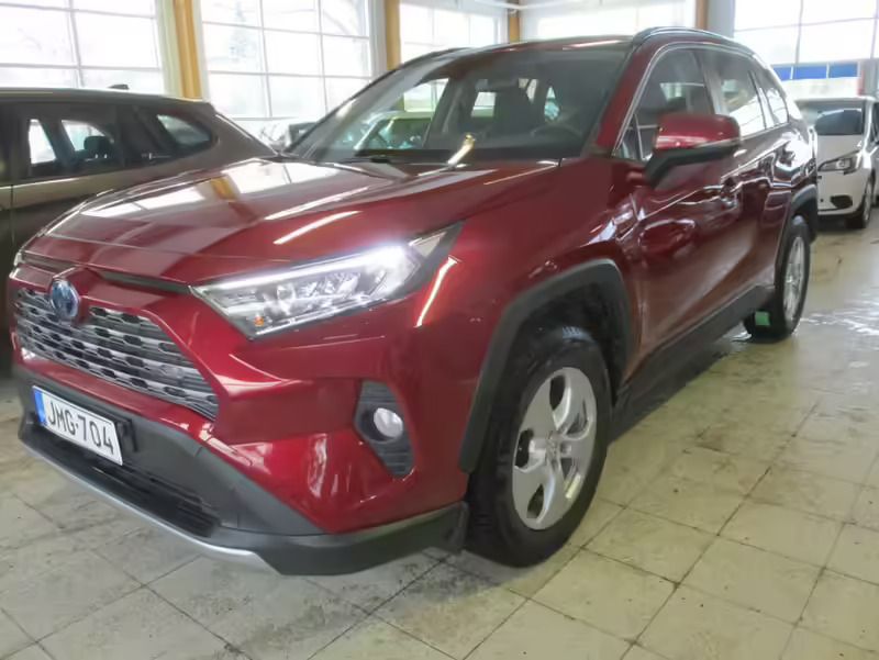 Met. punainen Käytetty 2021 Toyota RAV4 Hybrid Active Katumaasturi | 34 980 € (Perustarjous) - Kuva 1/4