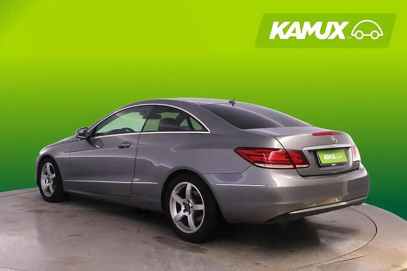 Käytetty Mercedes E220 170 HP (125 kW) 2014 Hopea / harmaa Coupe - kaksiovinen