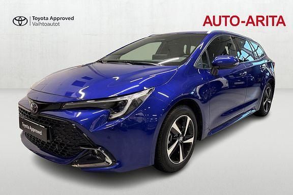Met. sininen Käytetty 2024 Toyota Corolla Anniversary Farmari | 31 970 € (Hieman kallis) - Kuva 1/4