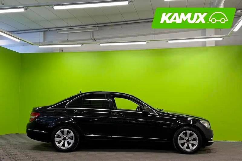 Käytetty Mercedes C180 Business 156 HP (114 kW) 2011 Musta Sedan