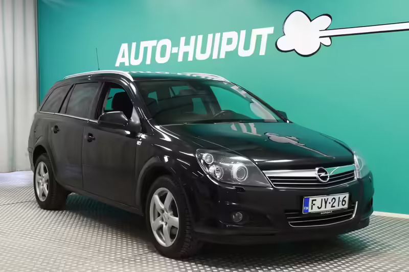 Musta Käytetty 2010 Opel Astra Ultimate Farmari | 4 400 € (Kallis) - Kuva 1/4