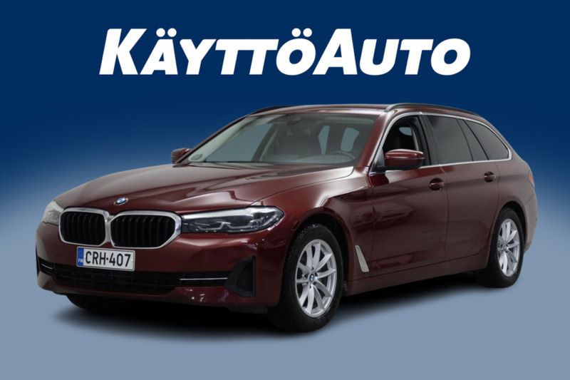 Met. punainen Käytetty 2023 BMW 520 Comfort Edition Farmari | 31 890 € (Perustarjous) - Kuva 1/4